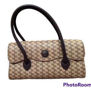 Rioni tan barrel style bag